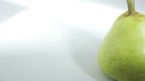 Video overview of a pear. Fruit Still Life in a white box.
Videos about fruit, pear.