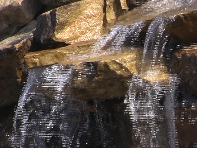 Water Running Off Rocks