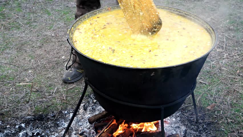 huge cauldron yellow soup cooked over Stock Footage Video (100%  Royalty-free) 15300721 | Shutterstock