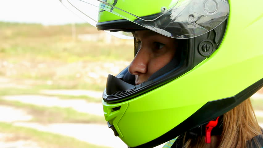 female biker shutting helmet visor Stock Footage Video (100% Royalty