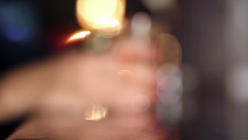 girl with glass of whiskey in the bar