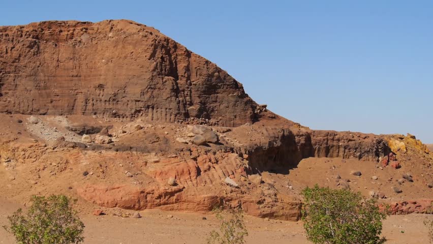 Burnt Egyptian mountains and sea.