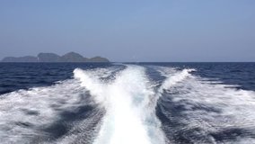 Water splash from high power speed boat during journey in Andaman sea Thailand