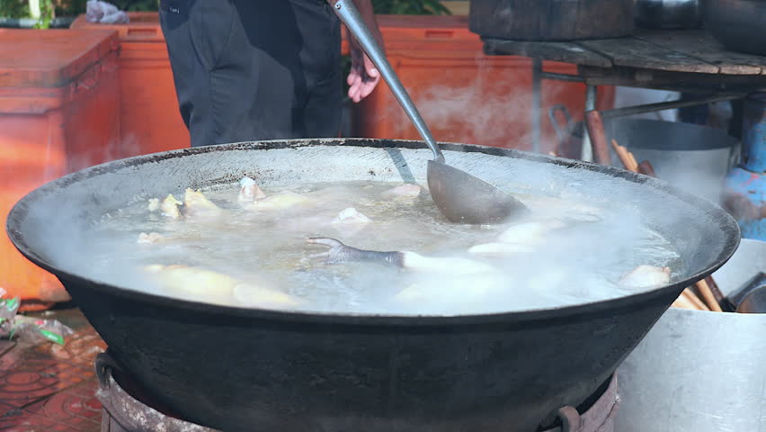 Ens Boiling In A Large Stock, Outdoor Wok Cooking