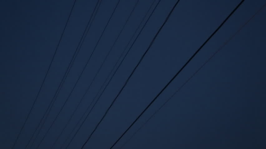 Driving POV looking up at telephone lines / Philadelphia, Pennsylvania - USA., May, 2013