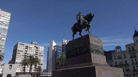 MONTEVIDEO, URUGUAY - FEBRUARY 11, 2016: Dolly shot to Artigas statue in Independence Square. Jose Gervasio Artigas is considered the father of Uruguay.
