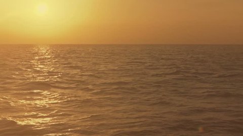 Sunset on the ocean in the Florida Keys. Golden sunset on ocean water in the Florida Keys. 