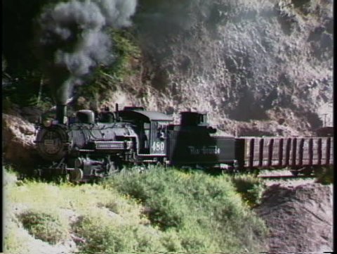 COLORADO, USA - CIRCA 2009: A Rio Grande steam engine pulling a freight train through the Rocky Mountains ountains circa 2009 in Colorado.