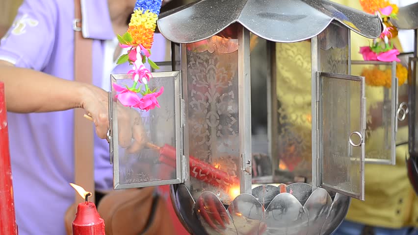 Chinese Red Candle with wind blow