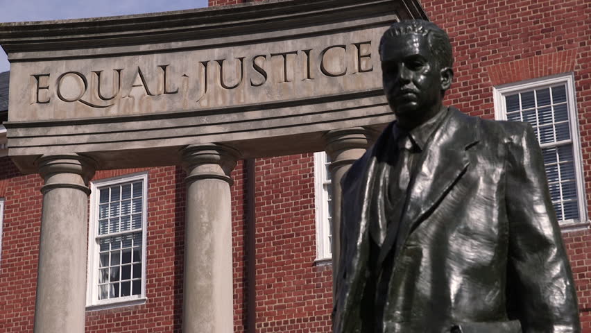 Close-up rack focus of the Thurgood Marshall memorial in front of the Maryland State House
