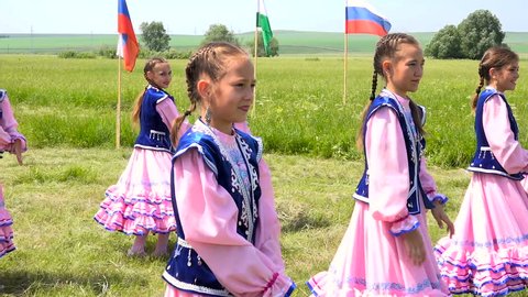 Yakchimbetovo/russia - Mar 21 2016: Russia, Bashkortostan, 15.06.2015, Rural Prazdnik.devushki Dancing National Dance