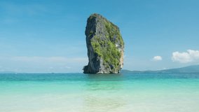 Ocean and beautiful cliff island near the Poda beach, Krabi province, Thailand. Timelapse video with vertical panning motion. - Powered by Shutterstock - Get 15% off with code: PIKWIZARD15