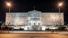 Illuminated Greek Parliament building at night, Athens, Greece. Time lapse video.