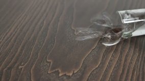 Glass of vodka falling and breaking - Powered by Shutterstock - Get 15% off with code: PIKWIZARD15