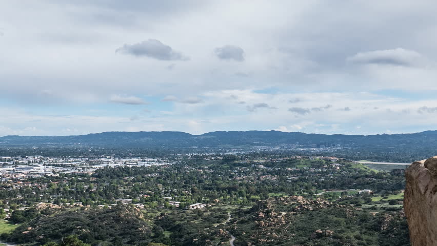 Time Lapse with Zoom of Clearing Storm Clouds above the West San Fernando Valley in Los Angeles California  | Shutterstock HD Video #15401695