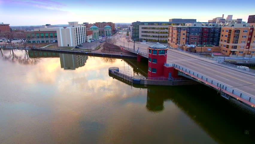 Scenic morning view of Green Bay Wisconsin, Main Street, seen from moving aerial perspective near Main Street Bridge.