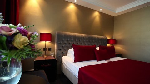 Double Bed in the Hotel Room, the Red Blanket, Burgundy Curtains, a Beautiful Room, View on a Hotel Room, the Interior of the Hotel, Room, Interior Design