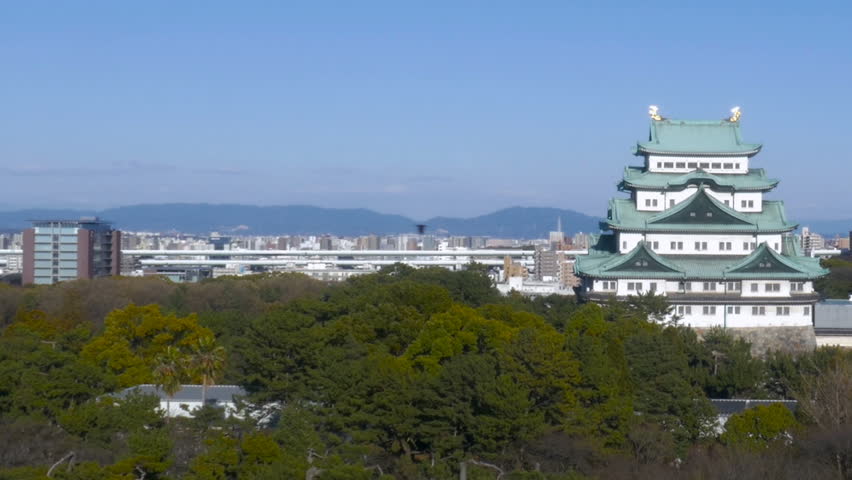 Panoramic view of Nagoya Castle in clear blue skies.