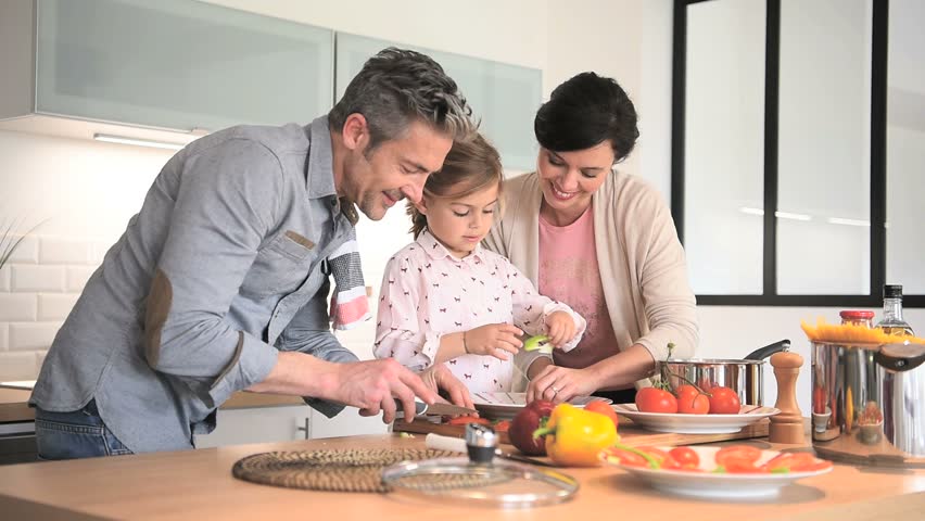Parents with Child Cooking Together Stock Footage Video 