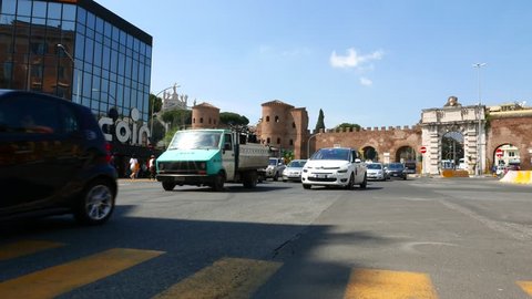 ROME, ITALY - APRIL 18: Traffic in front of the famous Porta San Giovanni on April 18, 2015 in Rome, Italy.
