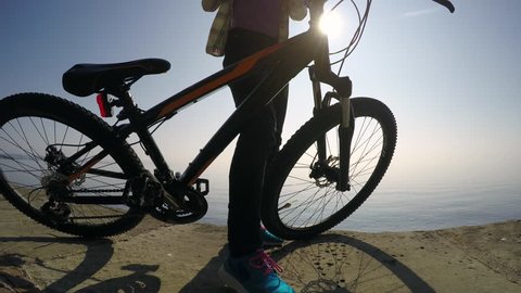Girl cycling in the sun