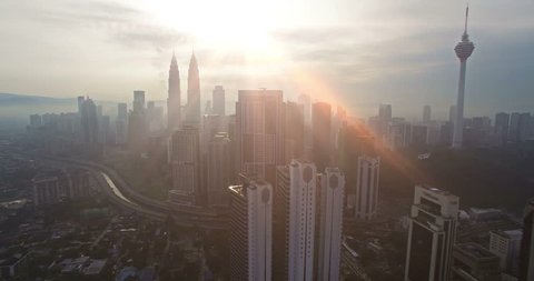 Aerial view of Kuala Lumpur city in Malaysia capital, tall buildings. Cinematic video of skyscrapers in big City.