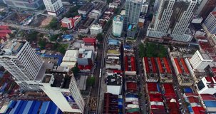 Aerial view of Kuala Lumpur city in Malaysia capital, tall buildings. Cinematic video of skyscrapers in big City.