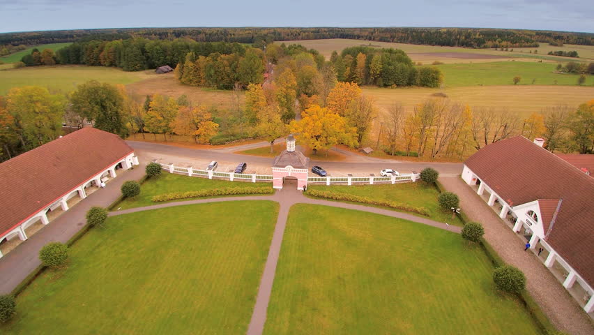 The aerial view of the front of Sagadi manor. Where cars parked outside visiting the manor in Lahemaa Park