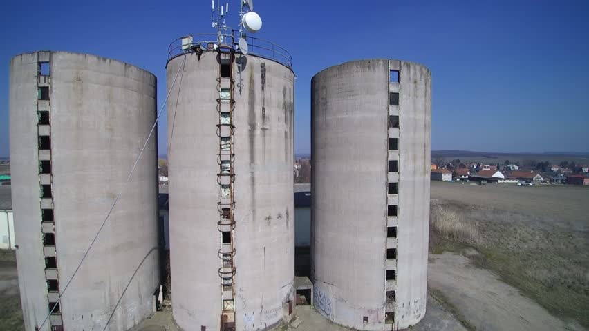 old farm silo with transmitter aerial shots