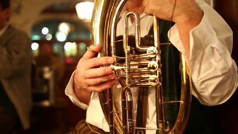 Traditional folk musicians play music in the Hofbrauhaus, the world-famous large beer restaurant