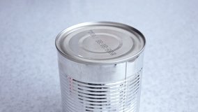 Close-up View of Man Opening Tin Can. 4K Ultra HD 3840x2160 Video Clip