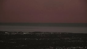 Helicopter flies over city and ocean on sunset (GRAED)
ungraded clip id: 15114397 