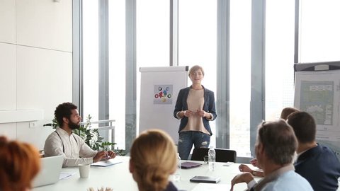 Smiling Businesswoman Giving Presentation Colleagues Stock Footage ...