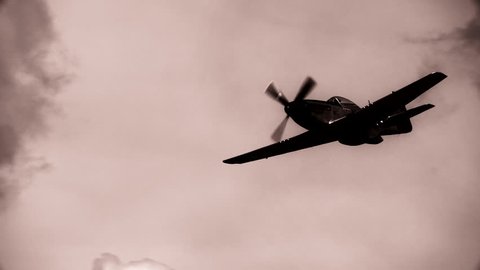 WWII P-51 Mustang Fighter flying in slow motion.  B&W.