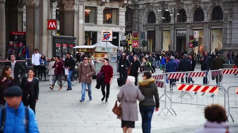Traffic of people Rush Hour in center of Milan in slow motion Duomo di Milano 21/03/2016 