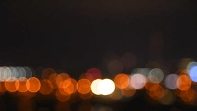 Out focus video clip of the cityscape at night with very nice bokeh.