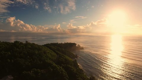 Aerial view of sunrise on Anse Royale in Mahe Island, Seychelles, 4K UHD ProRes