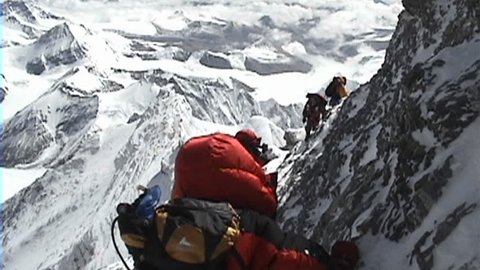 In the death zone climbing towards the summit of Everest - Climbers navigate difficult, scary terrain