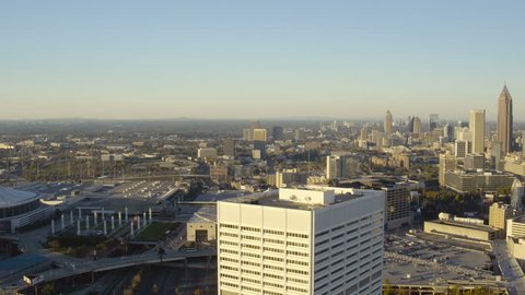 Atlanta Aerial v117 Flying low over building towards CNN building panning down. 11/15