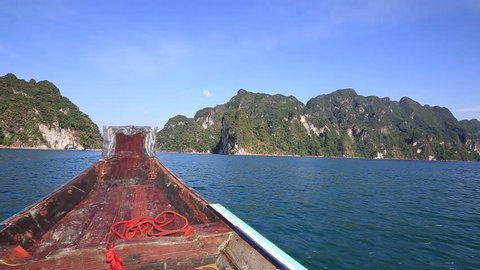 View sitting in a boat travel in lake at Khao Sok National Park, Surat Thani, Thailand.