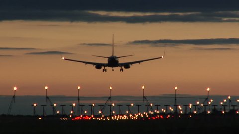 Jet Landing at Dublin Airport at Dusk