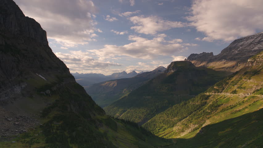 Scenic lookout on Going to the Sun road in Glacier National Park.  Camera pans. Montana. 4K