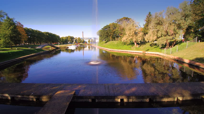 The lake in the middle of the building in Parnu in Estonia with lots of trees on the side of the lake