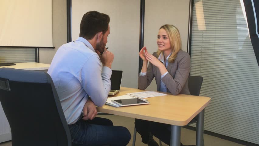 Young attractive woman during job interview