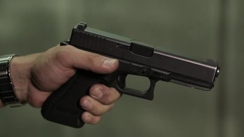 Shot of A gun being cocked close up