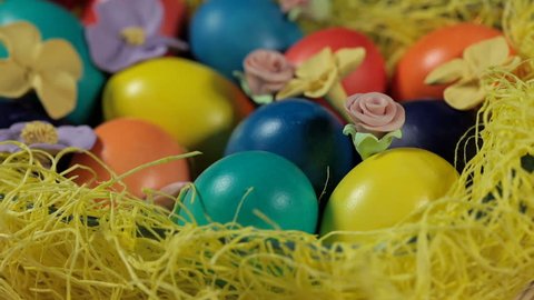 Colorful Easter eggs in a basket.  Stock Video