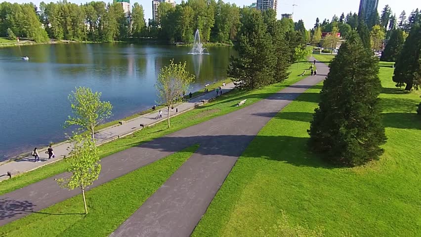 Aerial video of Town Centre Park and Lafarge Lake in Coquitlam near Vancouver Canada in the Pacific Northwest.