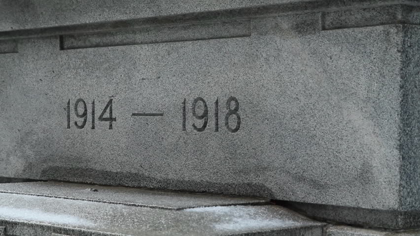 Detail of war memorial showing dates of WWI. 1914-1918. Detail from cenotaph at Old City Hall in Toronto, Ontario, Canada.
