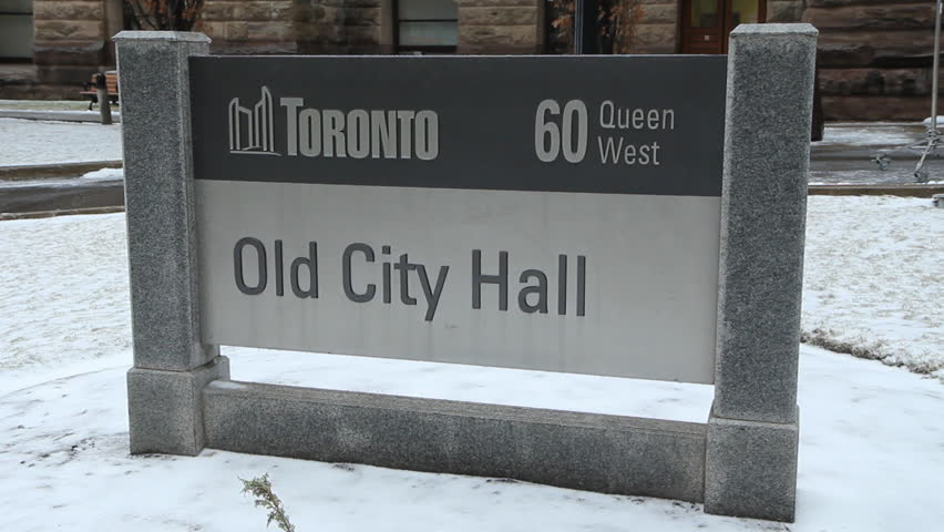 Sign in front of Old City Hall in Toronto, Ontario, Canada.