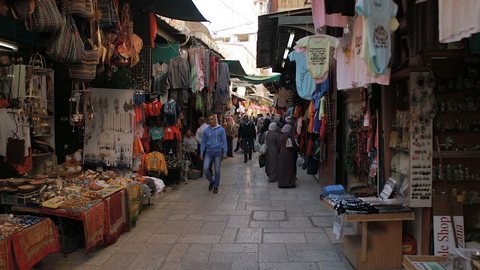 A tracking shot moving through the narrow streets of the Arab Quarter in Jerusalem/ Arab Quarter Shops